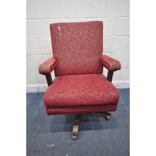 1337 - A 1940'S OAK SWIVEL CHAIR, on casters (condition report: worn fabric)