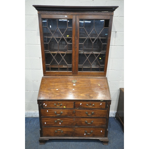 1339 - A GEORGIAN MAHOGANY BUREAU BOOKCASE, the top with blind fretwork and double astragal glazed doors, a... 