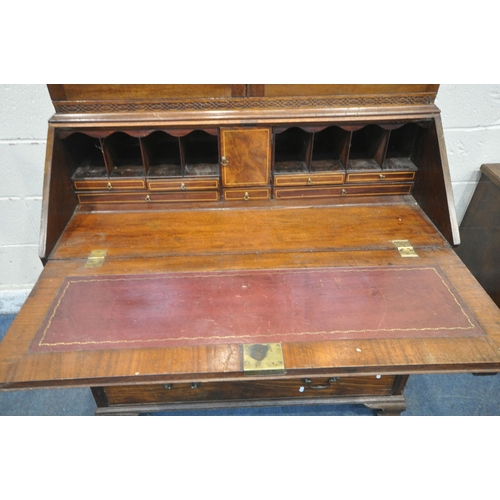 1339 - A GEORGIAN MAHOGANY BUREAU BOOKCASE, the top with blind fretwork and double astragal glazed doors, a... 