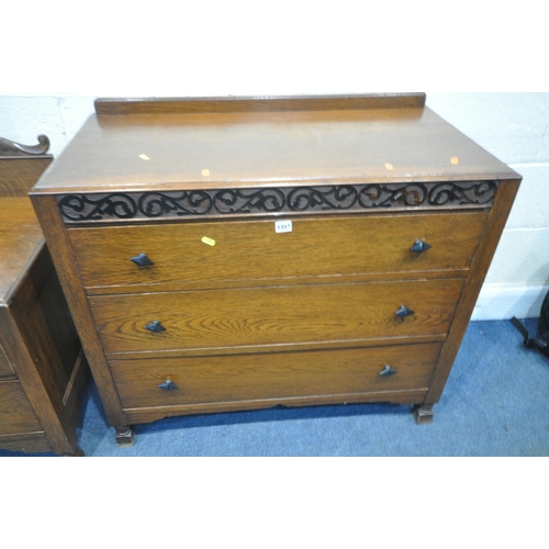 1357 - AN EARLY 20TH CENTURY OAK CHEST OF THREE LONG DRAWERS, width 91cm x depth 47cm x height 83cm, along ... 