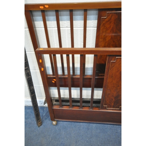 1359 - AN EARLY 20TH CENTURY MAHOGANY 4FT6 BEDSTEAD, with cast iron side rails (condition report: general s... 