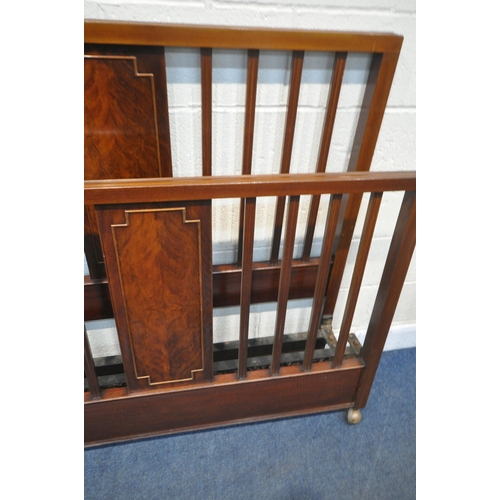 1359 - AN EARLY 20TH CENTURY MAHOGANY 4FT6 BEDSTEAD, with cast iron side rails (condition report: general s... 