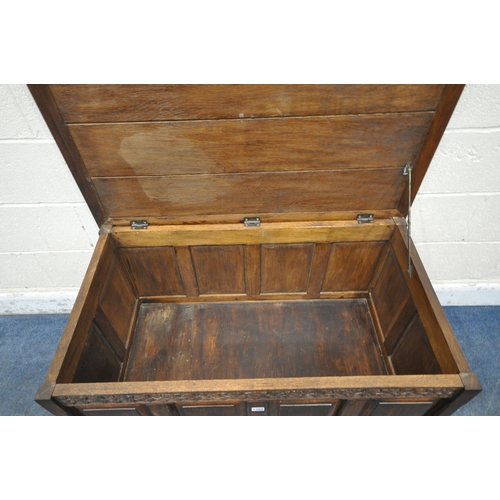 1360 - A 20TH CENTURY OAK BLANKET CHEST, with a hinged lid and foliate details, width 103cm x depth 60cm x ... 