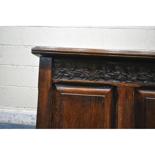 1360 - A 20TH CENTURY OAK BLANKET CHEST, with a hinged lid and foliate details, width 103cm x depth 60cm x ... 