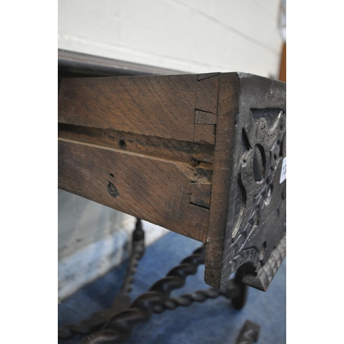 1380 - AN 18TH CENTURY CARVED OAK SIDE TABLE, the top edges with a rope edge, above a single frieze drawer,... 