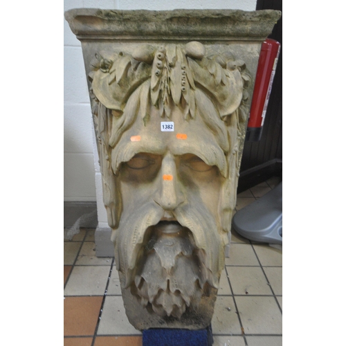 1382 - A WEATHERED COADE STONE KEYSTONE, modelled of a classical bearded male mask, stamped M to the top, w... 