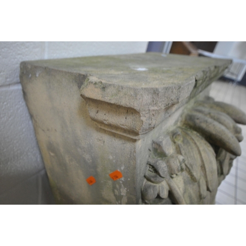 1382 - A WEATHERED COADE STONE KEYSTONE, modelled of a classical bearded male mask, stamped M to the top, w... 