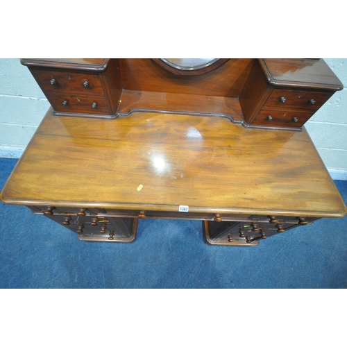 1387 - A 19TH CENTURY MAHOGANY TWIN PEDESTAL DRESSING TABLE, with an oval mirror, fitted with an arrangemen... 