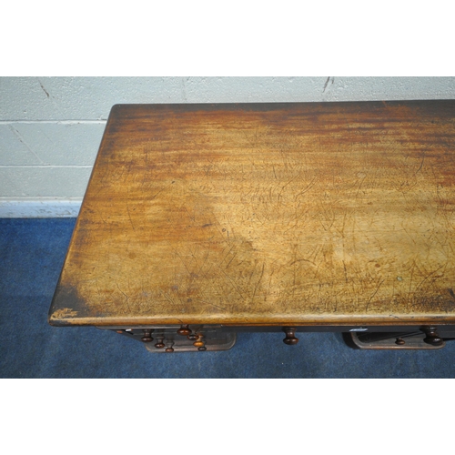 1389 - A VICTORIAN MAHOGANY TWIN PEDESTAL DESK, with an arrangement of nine drawers, on a plinth base, widt... 