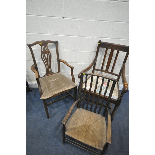 1396 - AN EDWARDIAN MAHOGANY BERGÈRE BACK ROCKING CHAIR, along with an oak open armchair, another armchair ... 