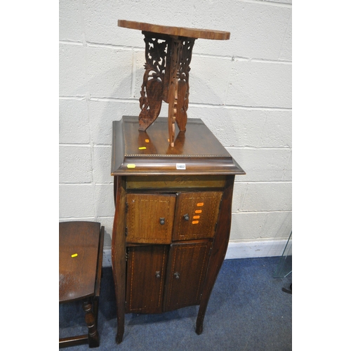 1407 - AN EARLY 20TH CENTURY MAHOGANY GRAMOPHONE CABINET, with a hinged lid and two pairs of doors, width 4... 