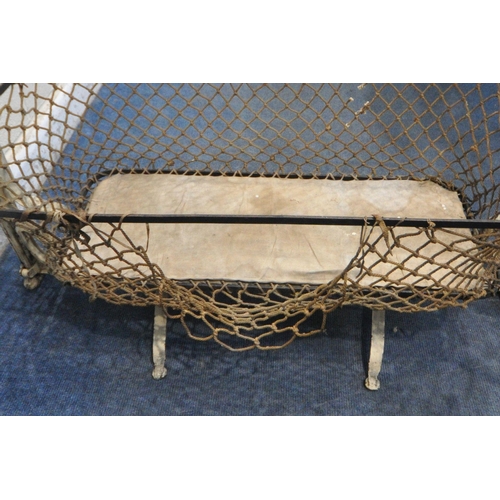 1410 - A VICTORIAN METAL FOLDING TRAVEL ROCKING CRIB (condition report: loose rope, some rust, losses to pa... 