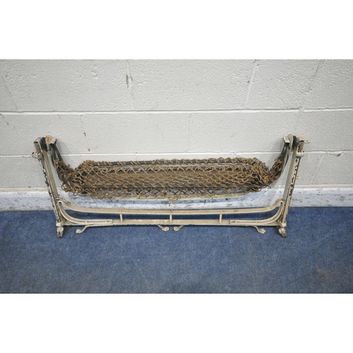 1410 - A VICTORIAN METAL FOLDING TRAVEL ROCKING CRIB (condition report: loose rope, some rust, losses to pa... 