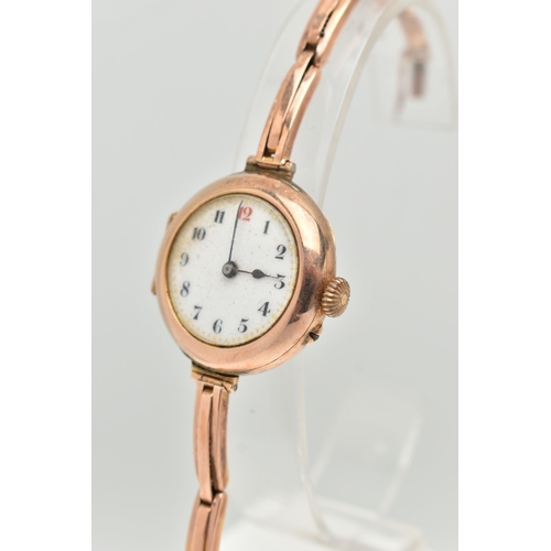 11 - AN EARLY 20TH CENTURY LADIES WRISTWATCH, hand wound movement, round dial, Arabic numerals, rose gold... 