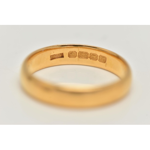 15 - A 22CT GOLD BAND RING, a plain polished band ring, approximate width 4mm, hallmarked 22ct Birmingham... 