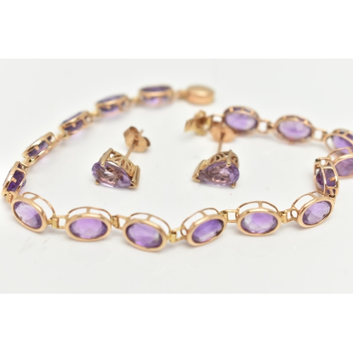 21 - A 14CT GOLD AMETHYST BRACELET AND A PAIR OF 9CT GOLD STUD EARRINGS, the bracelet links designed as o... 