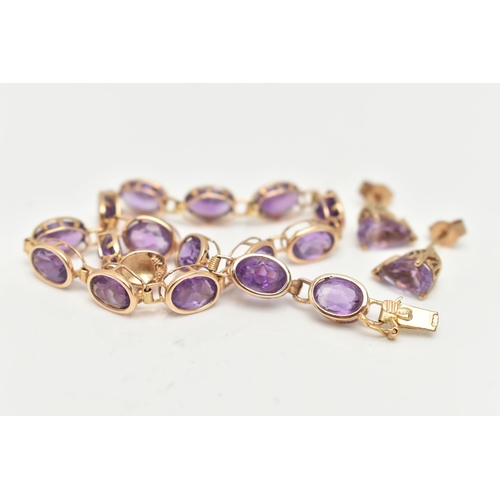 21 - A 14CT GOLD AMETHYST BRACELET AND A PAIR OF 9CT GOLD STUD EARRINGS, the bracelet links designed as o... 