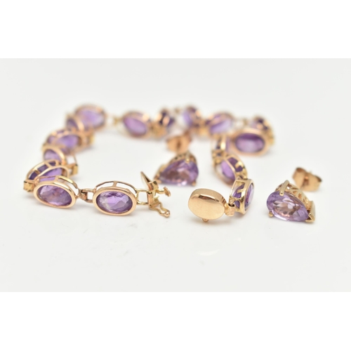 21 - A 14CT GOLD AMETHYST BRACELET AND A PAIR OF 9CT GOLD STUD EARRINGS, the bracelet links designed as o... 