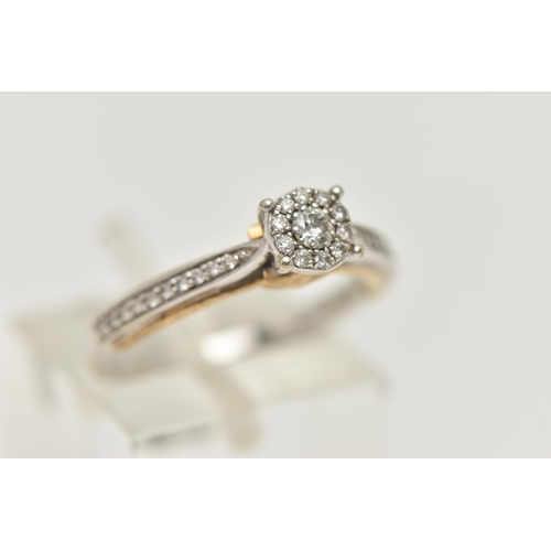 29 - A 9CT WHITE GOLD DIAMOND RING, designed as a central brilliant cut diamond within a brilliant cut di... 