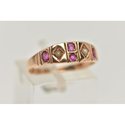 30 - A MID VICTORIAN 15CT GOLD RUBY AND SPLIT PEARL RING, designed as two split pearls interspaced by rub... 