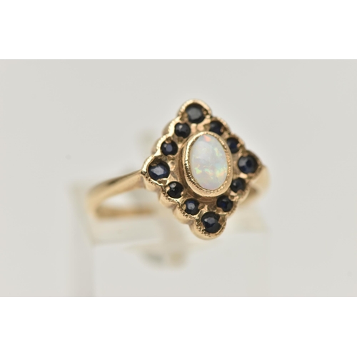 34 - A 9CT GOLD OPAL AND SAPPHIRE RING, designed as a central oval opal cabochon within a circular sapphi... 