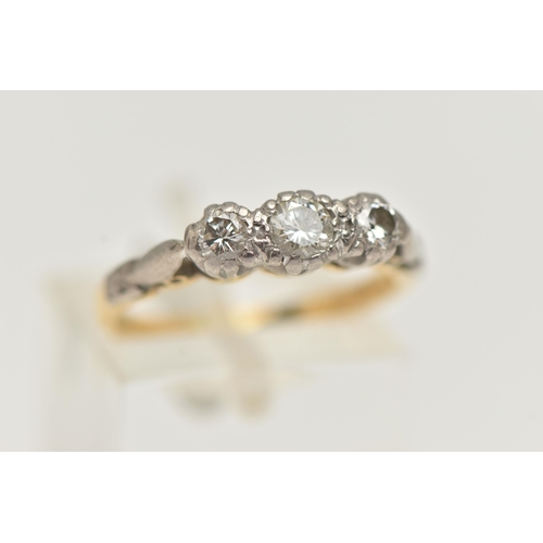 37 - A THREE STONE DIAMOND RING, designed as three graduated brilliant cut diamonds, estimated total diam... 