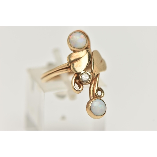 38 - A 9CT GOLD OPAL AND DIAMOND RING, the up finger ring with central single cut diamond and foliate des... 