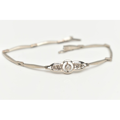 42 - A DIAMOND BRACELET, the central openwork panel set with an old cut diamond flanked by three rose cut... 