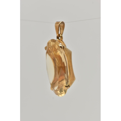 54 - A 9CT GOLD CITRINE PENDANT, of an oval form, in a four claw setting, hallmarked 9ct London, fitted w... 