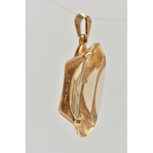 54 - A 9CT GOLD CITRINE PENDANT, of an oval form, in a four claw setting, hallmarked 9ct London, fitted w... 