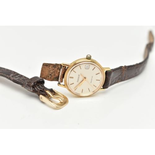 59 - A LADIES 'TISSOT' WRISTWATCH, round gold tone dial signed 'Tissot Seastar', baton markers, date wind... 