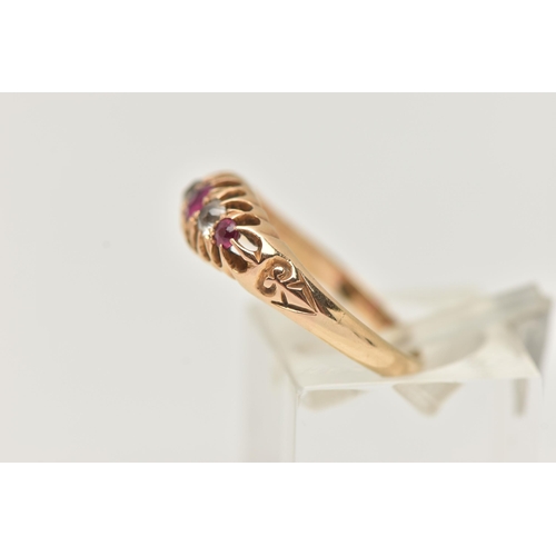 101 - AN 18CT GOLD GEM SET BOAT RING, set with three circular cut rubies, interspaced with two circular cu... 