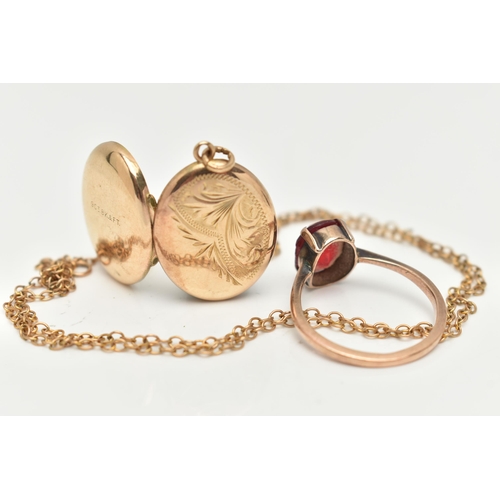 134 - A YELLOW METAL RING, CHAIN AND OVAL LOCKET, the ring set with a rubbed and worn, oval cut red paste,... 