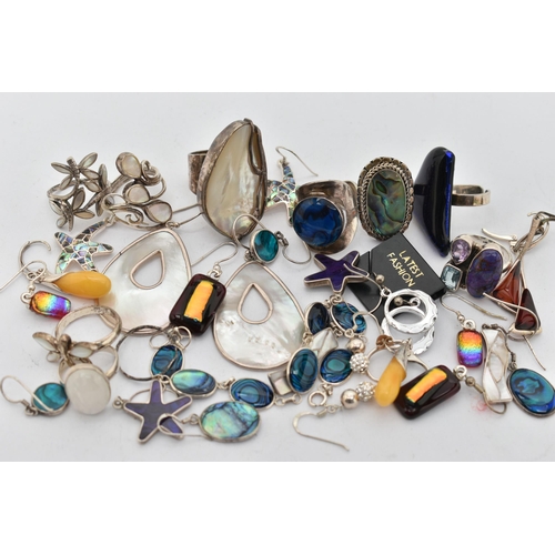 142 - ASSORTED WHITE METAL RINGS AND EARRINGS, to include eight rings of various designs, set with semi-pr... 