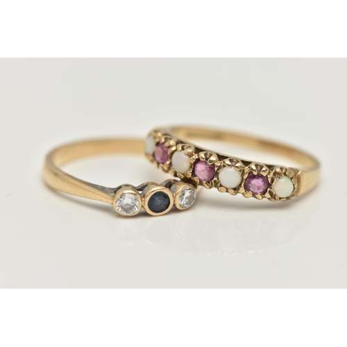 74 - TWO 9CT GOLD GEM SET RINGS, the first designed as a central circular cut sapphire flanked by brillia... 