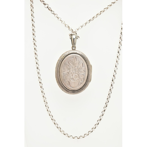 85 - A LOCKET AND A CHAIN, a base metal oval locket with embossed floral and acanthus detail, together wi... 