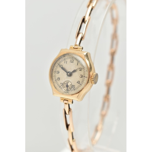 87 - A 1920S LADIES 9CT GOLD WRISTWATCH, manual wind, round silvered dial, Arabic numerals, blue steel ha... 