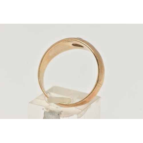 95 - A GENTS 9CT GOLD SIGNET RING, set with a circular cut colourless spinel, in a star setting, polished... 