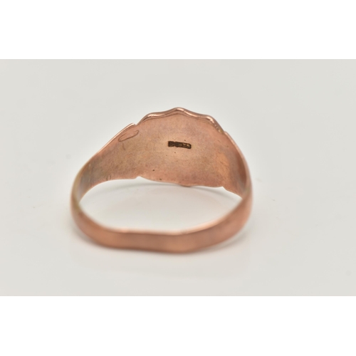 96 - A GENTS 9CT ROSE GOLD SIGNET RING, engraved shield signet, textured shoulders leading onto a misshap... 