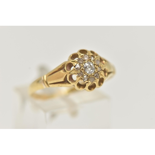 98 - AN 18CT GOLD DIAMOND CLUSTER RING, circular cluster, set with a central old cut diamond, within a su... 