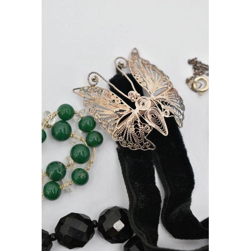 156 - A BAG OF COSTUME JEWELLERY, two paste set white metal necklaces, a green beaded necklace, a mother o... 