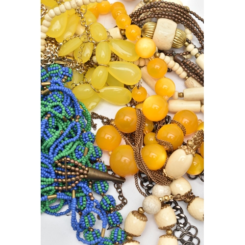 163 - A BAG OF ASSORTED BEADED COSTUME JEWELLERY, to include a carved bone bead necklace, orange and yello... 