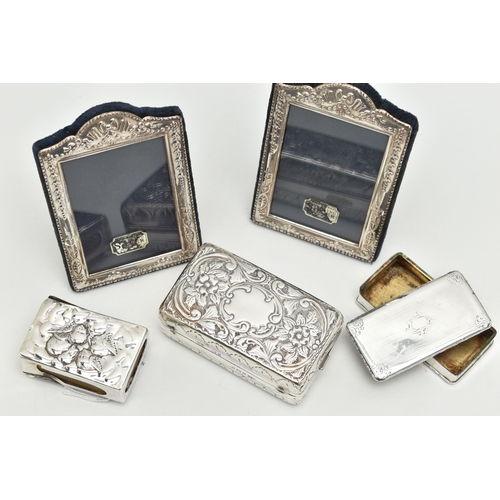 176 - A SMALL PARCEL OF SILVER, a pair of Elizabeth II rectangular easel back photograph frames, foliate d... 