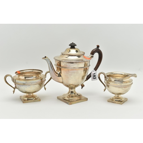 183 - AN EARLY 20TH CENTURY SILVER THREE PIECE TEA SET, comprising of a teapot, sugar bowl and milk jug, e... 