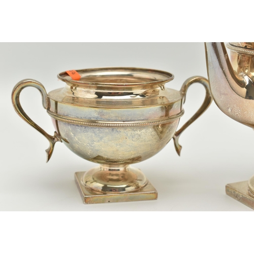 183 - AN EARLY 20TH CENTURY SILVER THREE PIECE TEA SET, comprising of a teapot, sugar bowl and milk jug, e... 