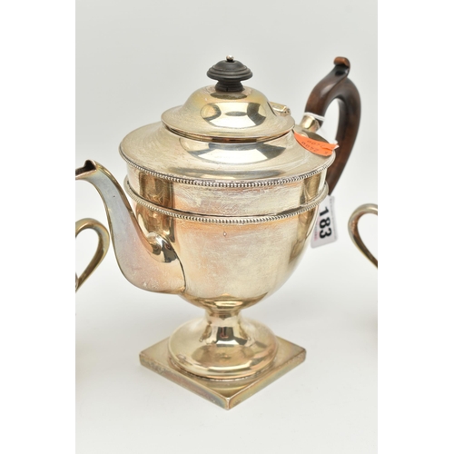 183 - AN EARLY 20TH CENTURY SILVER THREE PIECE TEA SET, comprising of a teapot, sugar bowl and milk jug, e... 