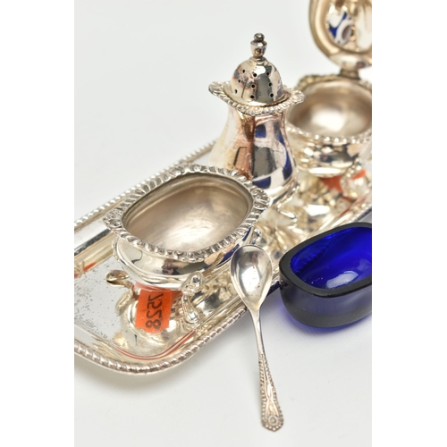 187 - AN ELIZABETH II SILVER THREE PIECE CRUET SET ON TRAY, comprising a rectangular tray, pepperette, mus... 