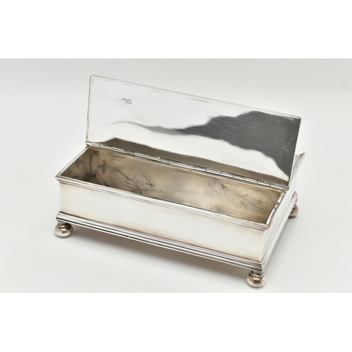 191 - AN EDWARD VII SILVER DESK STAND OF RECTANGULAR FORM, hinged carrying handle to the centre, hinged co... 