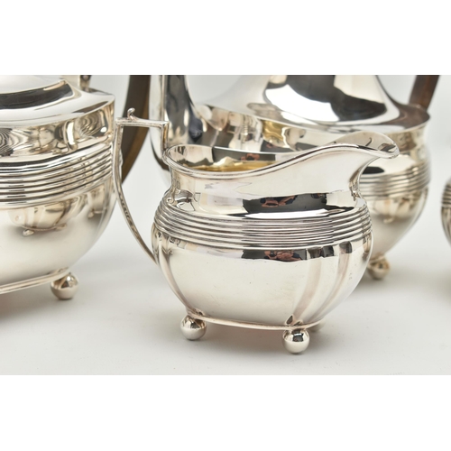 192 - A GEORGE V SILVER FOUR PIECE TEA SERVICE OF SHAPED RECTANGULAR FORM, reeded horizonal band detail an... 