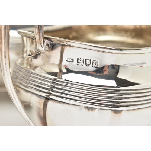 192 - A GEORGE V SILVER FOUR PIECE TEA SERVICE OF SHAPED RECTANGULAR FORM, reeded horizonal band detail an... 